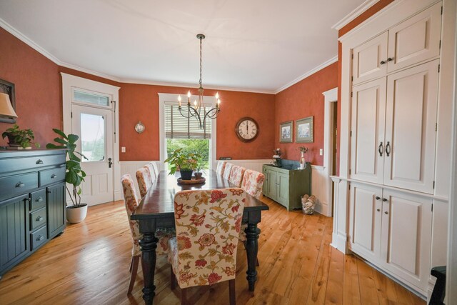 1452 W Cook Rd, Mansfield, OH 44906 - dining room with a chandelier, light wood-style flooring, wainscoting, and ornamental molding