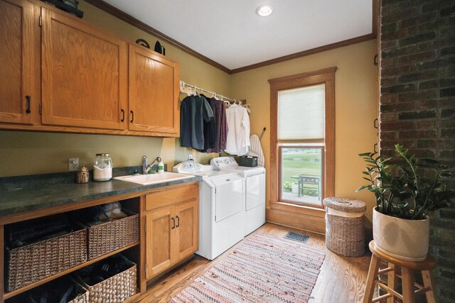 1452 W Cook Rd, Mansfield, OH 44906 - laundry room featuring washer and clothes dryer, cabinet space, light wood-style floors, ornamental molding, and recessed lighting