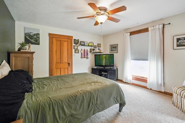 1452 W Cook Rd, Mansfield, OH 44906 - bedroom featuring carpet, baseboards, and a ceiling fan