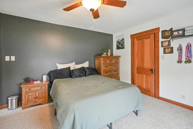 1452 W Cook Rd, Mansfield, OH 44906 - bedroom with light colored carpet, baseboards, and a ceiling fan