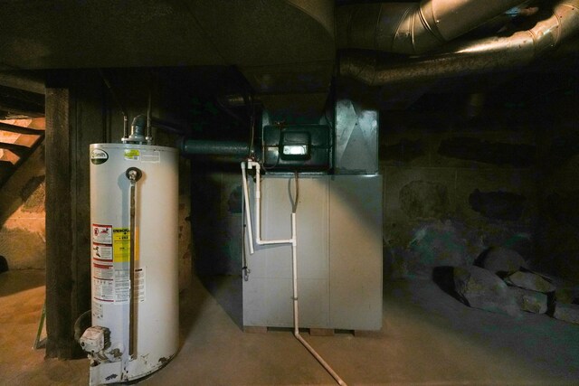 1452 W Cook Rd, Mansfield, OH 44906 - utility room featuring water heater and heating unit