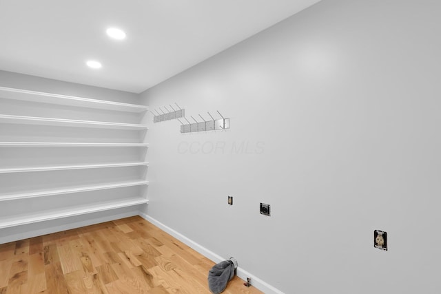 5744 Burcale Dr, Galloway, OH 43119 - washroom with baseboards, light wood finished floors, gas dryer hookup, recessed lighting, and electric dryer hookup