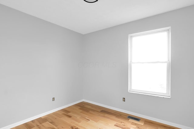 5744 Burcale Dr, Galloway, OH 43119 - empty room with baseboards and light wood-style flooring