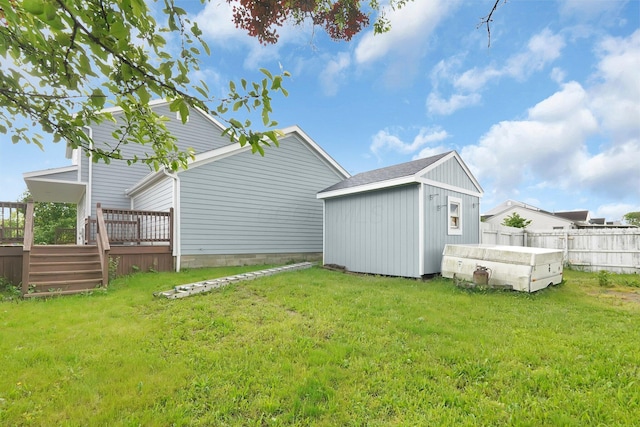 5744 Burcale Dr, Galloway, OH 43119 - view of yard with a storage shed, a wooden deck, and an outdoor structure