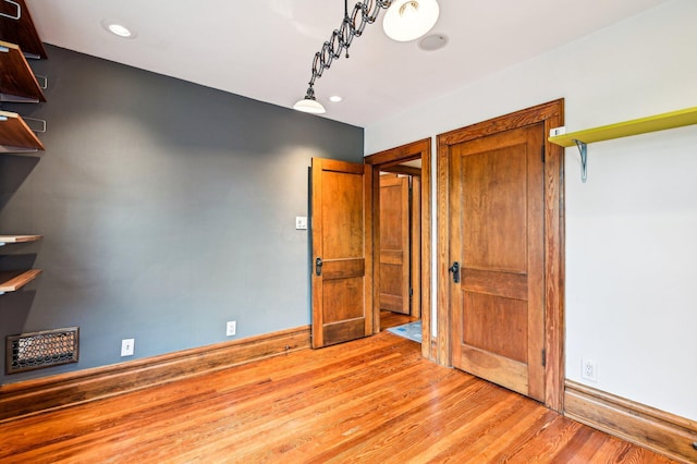 116 E Tulane Rd, Columbus, OH 43202 - unfurnished bedroom featuring light wood-type flooring and baseboards