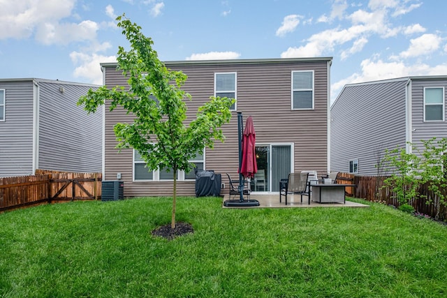 back of house featuring a patio area