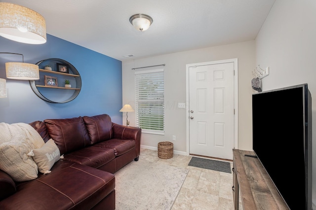 living room with baseboards