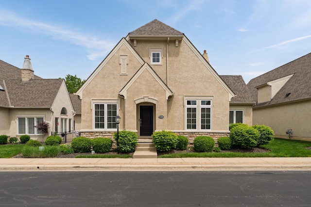 9785 Kingston Cir, Powell, OH 43065 - view of front of property with stucco siding and stone siding