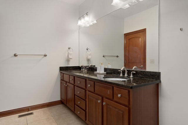 9785 Kingston Cir, Powell, OH 43065 - bathroom with tile patterned flooring, double vanity, and baseboards