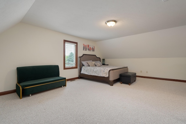 9785 Kingston Cir, Powell, OH 43065 - carpeted bedroom featuring lofted ceiling and baseboards