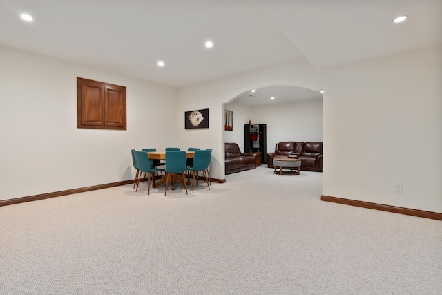 9785 Kingston Cir, Powell, OH 43065 - dining room featuring arched walkways, carpet flooring, recessed lighting, and baseboards
