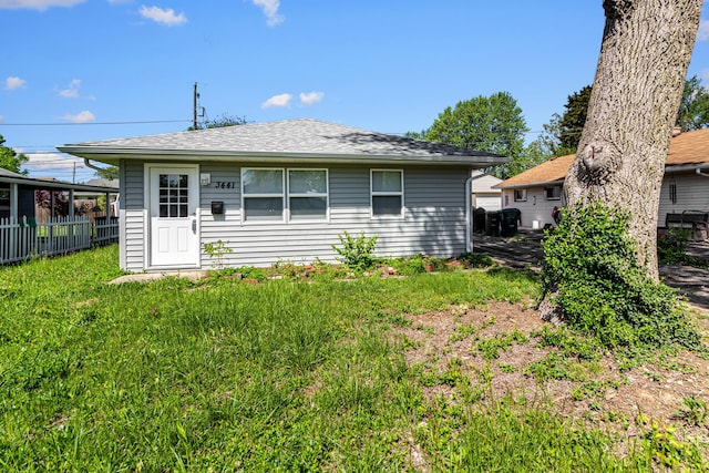 3441 Homestead Dr, Columbus, OH 43224 - rear view of house featuring fence and roof with shingles