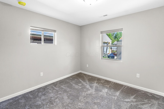 3441 Homestead Dr, Columbus, OH 43224 - carpeted spare room featuring baseboards and a smoke detector