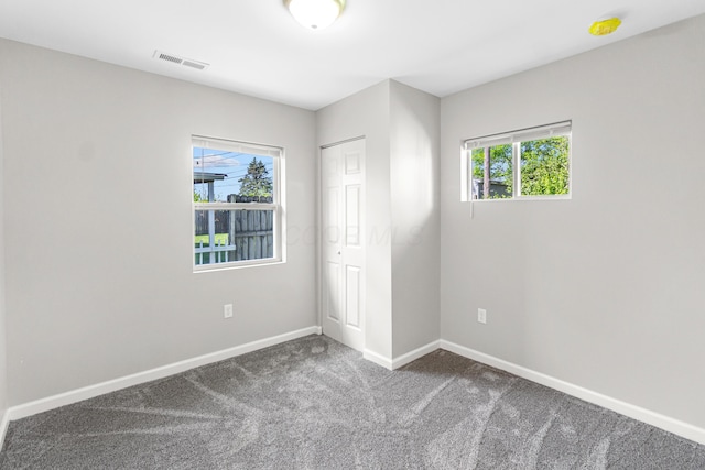 3441 Homestead Dr, Columbus, OH 43224 - unfurnished bedroom with carpet flooring, baseboards, and a closet