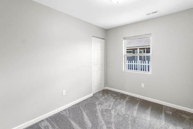 3441 Homestead Dr, Columbus, OH 43224 - carpeted empty room with baseboards