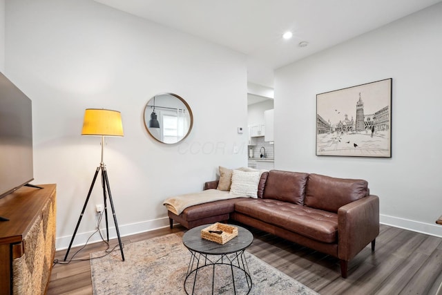 2230 N 4th St, Columbus, OH 43201 - living room with wood finished floors, baseboards, and recessed lighting