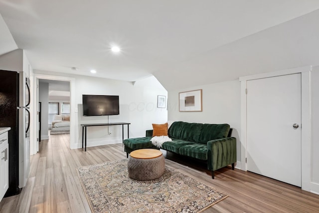 2230 N 4th St, Columbus, OH 43201 - living room featuring light wood-style flooring, recessed lighting, and baseboards