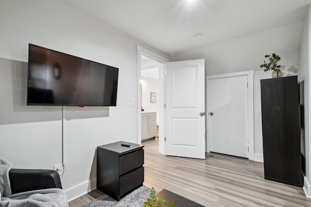 2230 N 4th St, Columbus, OH 43201 - living area with light wood-style floors and baseboards