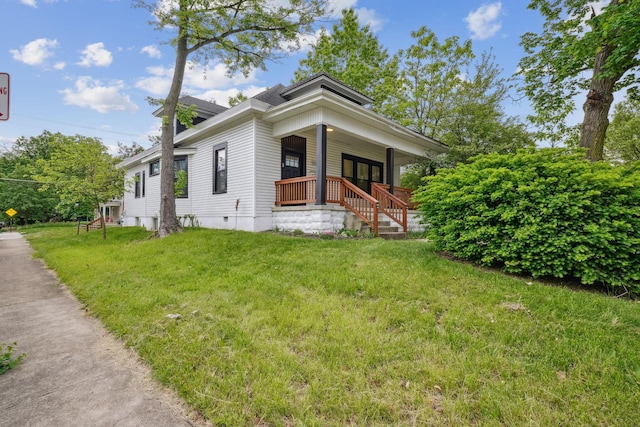 2230 N 4th St, Columbus, OH 43201 - view of front of house featuring a porch and a front yard
