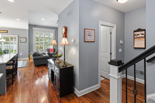 3687 Foresta Grand Dr, Powell, OH 43065 - hall featuring wood finished floors, recessed lighting, and stairs