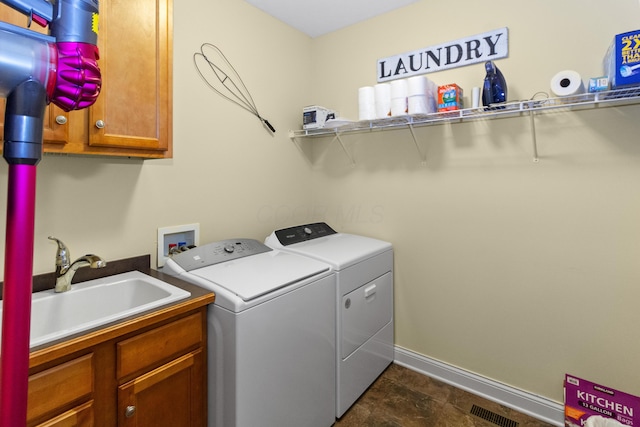 3687 Foresta Grand Dr, Powell, OH 43065 - laundry area with washer and dryer and cabinet space