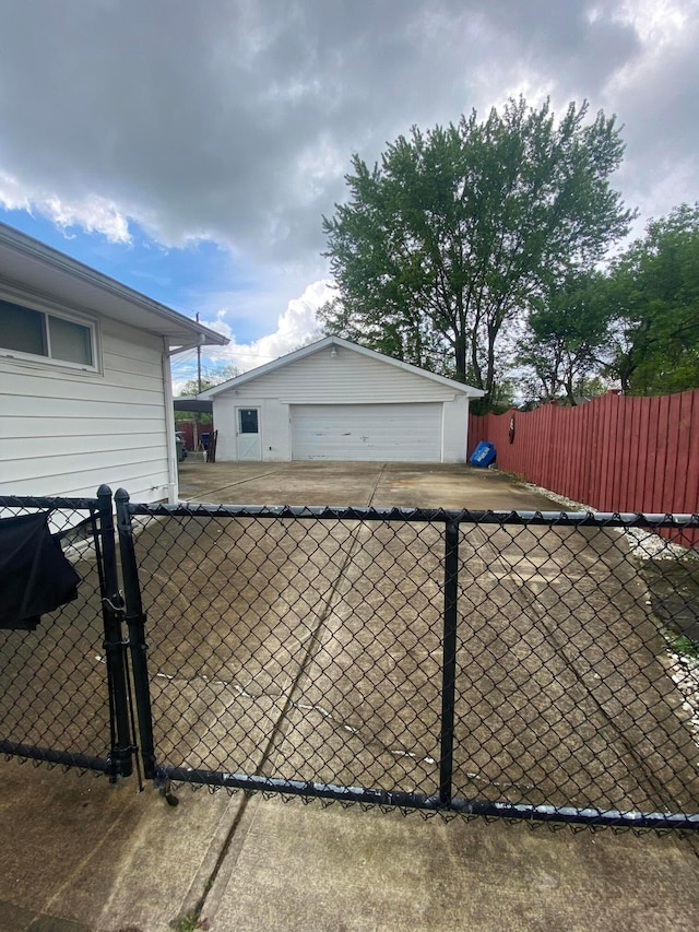 1616 Sale Rd, Columbus, OH 43224 - exterior space featuring fence, an outdoor structure, and a detached garage