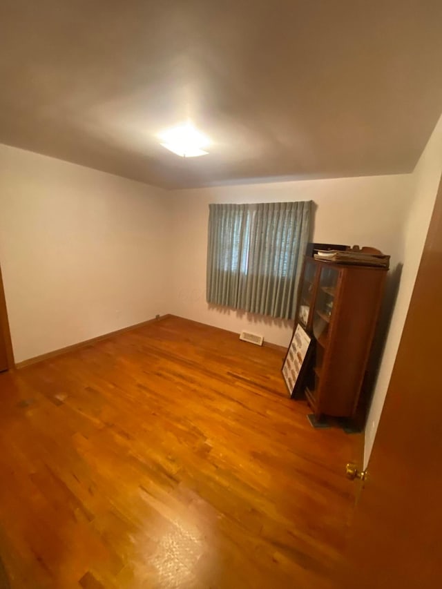 1616 Sale Rd, Columbus, OH 43224 - empty room featuring wood finished floors