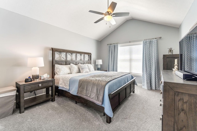 bedroom featuring lofted ceiling, light carpet, a ceiling fan, and baseboards
