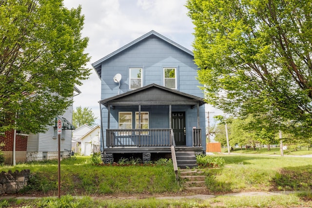traditional style home with covered porch