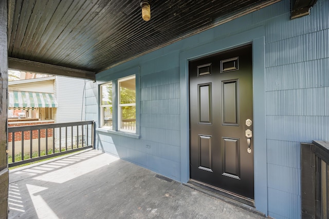 entrance to property with a porch