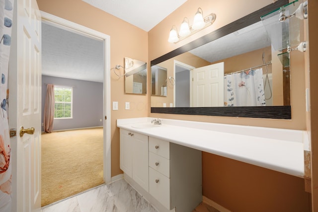 4618 Parrau Dr Unit 72B, Columbus, OH 43228 - bathroom with vanity, baseboards, and marble finish floors