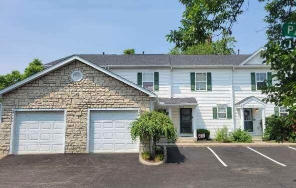4618 Parrau Dr Unit 72B, Columbus, OH 43228 - multi unit property featuring stone siding and asphalt driveway
