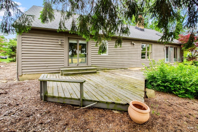 251 Longbranch Dr, Dublin, OH 43017 - back of property with a deck, roof with shingles, and a chimney