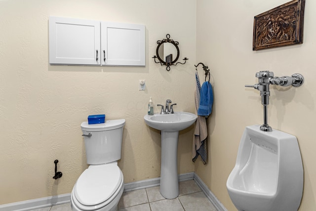 251 Longbranch Dr, Dublin, OH 43017 - half bathroom with toilet, tile patterned floors, a sink, and baseboards