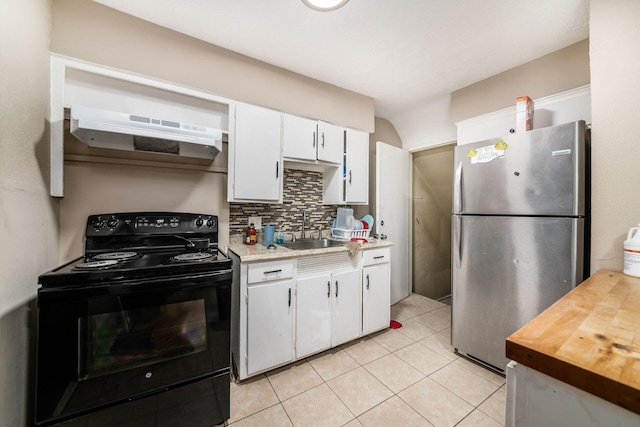 922-924 Geers Ave, Columbus, OH 43206 - kitchen with freestanding refrigerator, black electric range, a sink, under cabinet range hood, and tasteful backsplash