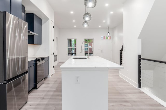 1177 Franklin Ave, Columbus, OH 43205 - kitchen featuring freestanding refrigerator, a sink, stove, light wood-style floors, and recessed lighting
