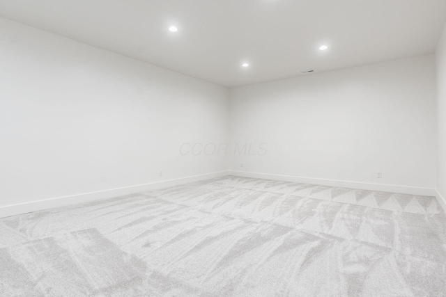 1177 Franklin Ave, Columbus, OH 43205 - unfurnished room featuring light colored carpet, recessed lighting, and baseboards