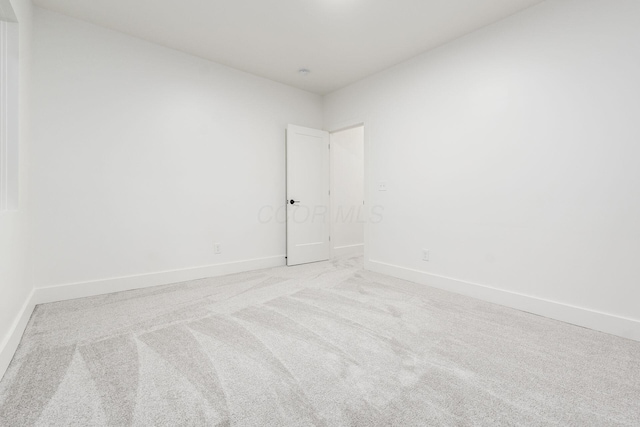 1177 Franklin Ave, Columbus, OH 43205 - spare room with light carpet and baseboards