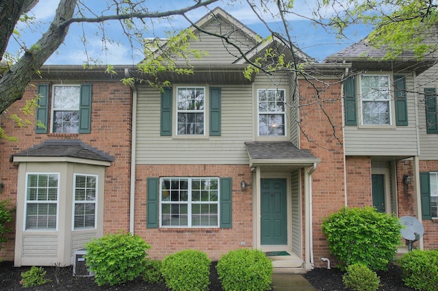 2999 Glenloch Cir, Dublin, OH 43017 - view of front of house featuring brick siding and central AC unit