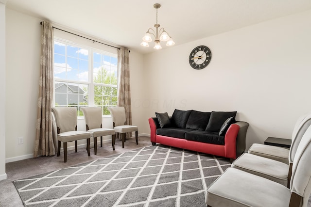 8123 Comstock Ter NW, Pickerington, OH 43147 - living area featuring a chandelier, carpet flooring, and baseboards