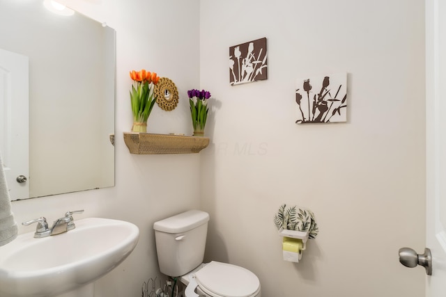 8123 Comstock Ter NW, Pickerington, OH 43147 - half bath with a sink and toilet