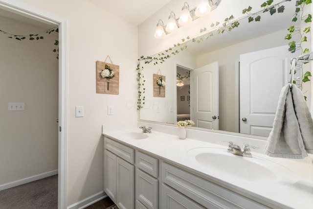 8123 Comstock Ter NW, Pickerington, OH 43147 - full bathroom featuring double vanity and baseboards
