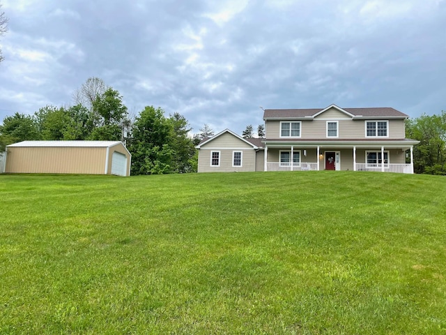 7719 Bear Run Rd, Logan, OH 43138 - view of front facade with covered porch, a garage, an outdoor structure, and a front yard