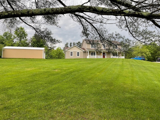 7719 Bear Run Rd, Logan, OH 43138 - rear view of house with a lawn and an outbuilding