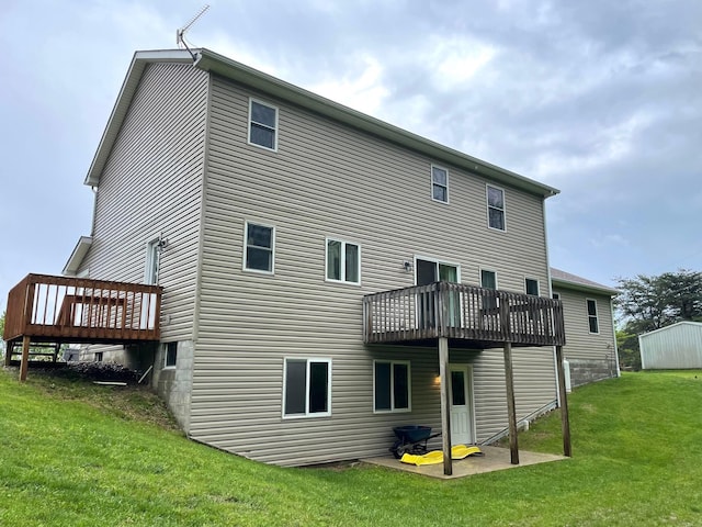 7719 Bear Run Rd, Logan, OH 43138 - rear view of property with a yard, a wooden deck, and a patio