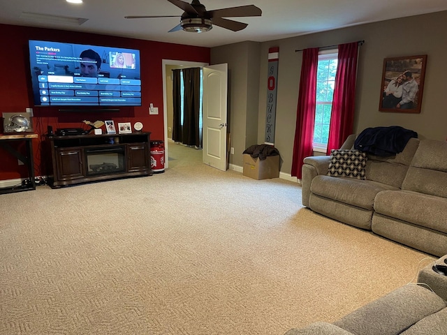 7719 Bear Run Rd, Logan, OH 43138 - living area with ceiling fan, carpet flooring, and baseboards