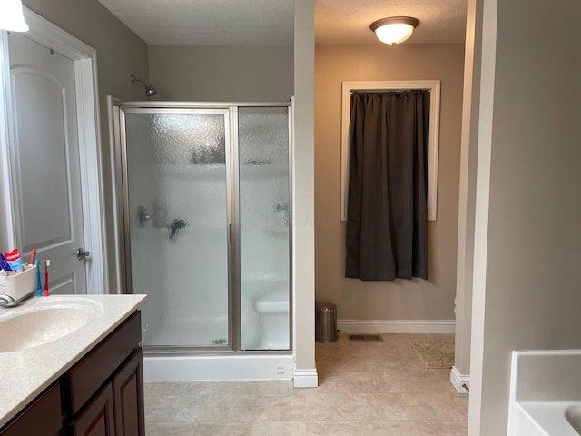 7719 Bear Run Rd, Logan, OH 43138 - bathroom with a stall shower, baseboards, and vanity