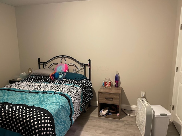 7719 Bear Run Rd, Logan, OH 43138 - bedroom with wood finished floors and baseboards