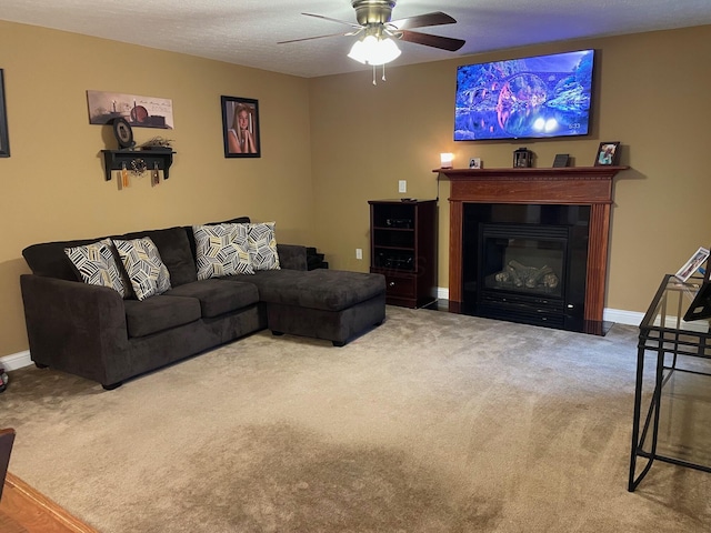 7719 Bear Run Rd, Logan, OH 43138 - living room featuring carpet, ceiling fan, baseboards, and a fireplace with flush hearth