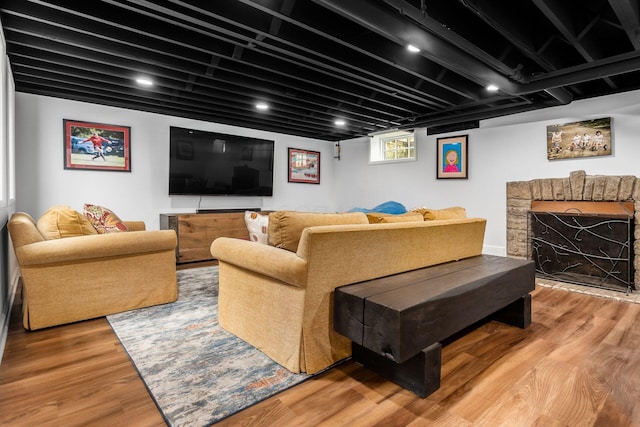 cinema featuring light wood-style flooring